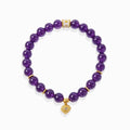 Glossy natural Amethyst Aura Evil Eye Bracelet with gold evil eye protection charm and mantra spacer bead, white background spiritual crystal jewelry for women