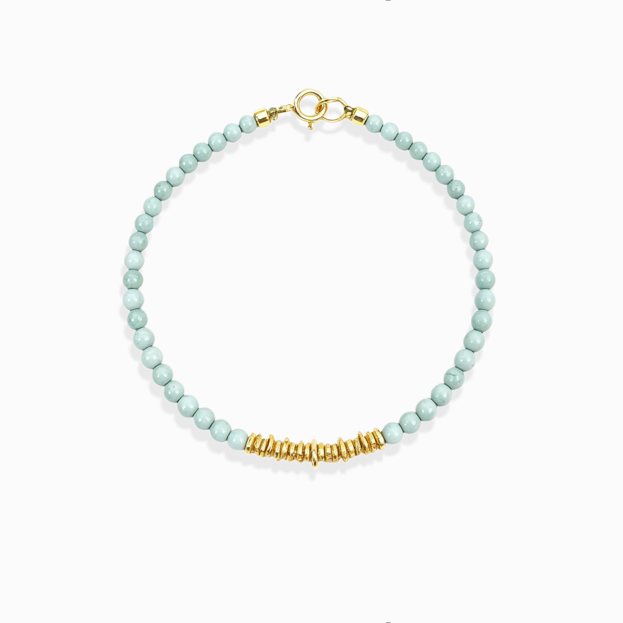 Dainty gold beaded Calm Tide turquoise chip bracelet, natural pale aqua ocean crystal bracelet isolated white background