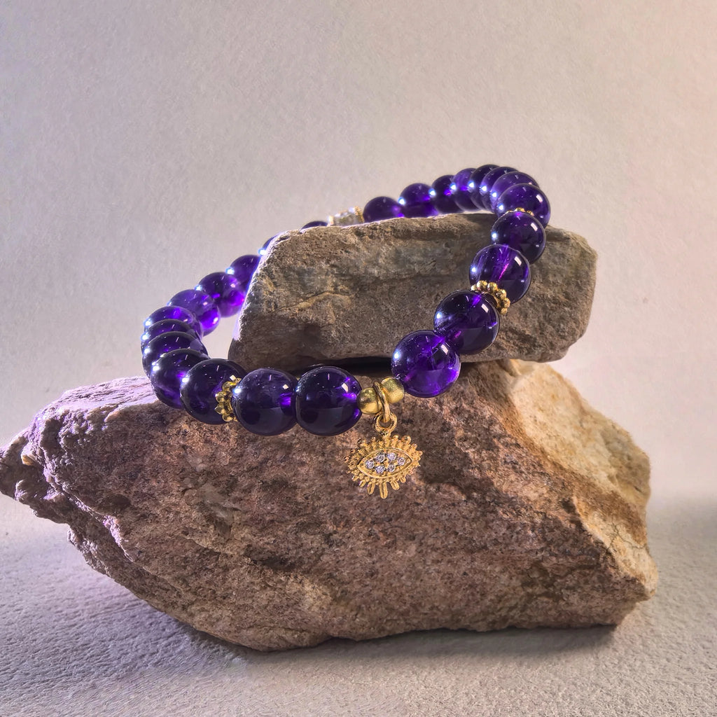 Side angle of Amethyst Aura Evil Eye Bracelet, meaningful gift for her