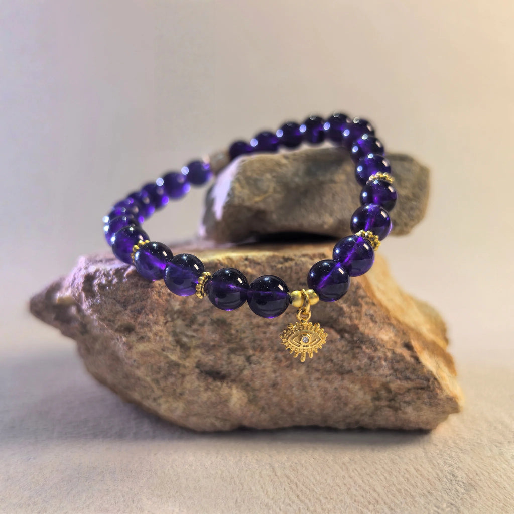 Side angle of Amethyst Aura Evil Eye Bracelet, intuition talisman jewelry and best gift for mom