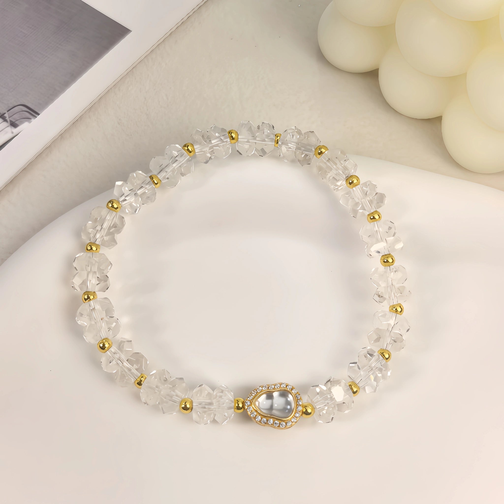Ins style still life shot of First Light Clear Quartz Bracelet for daily meditation intuition.