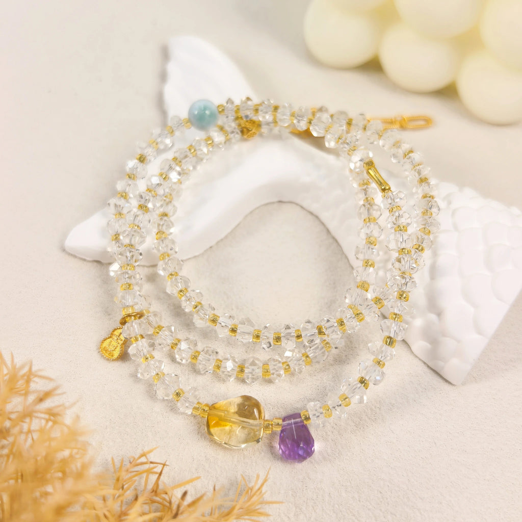 Ins style still life shot of Three Graces clear quartz wrap bracelet layered mystiic crystal gift for spiritual women