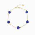 Milky Way Stroll Lapis Lazuli Bracelet with deep blue lapis beads, gold chain, white background dainty spiritual crystal jewelry for women