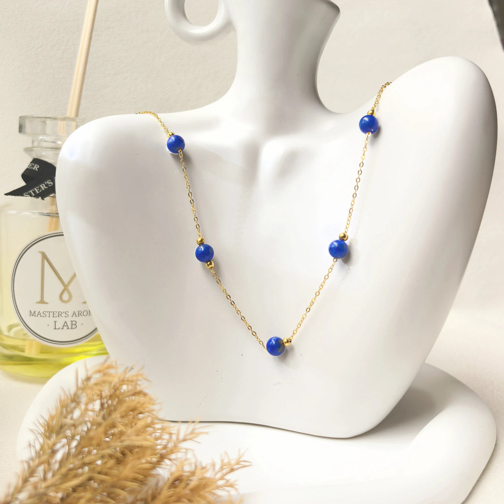 Ins aesthetic still life shot of Milky Way Stroll lapis lazuli necklace,  spiritual jewelry gift for women