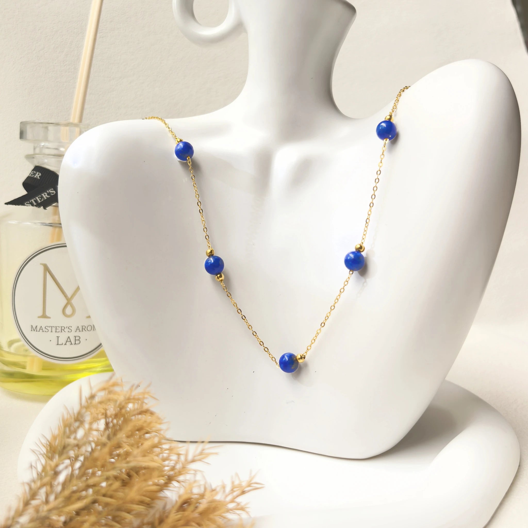 Ins aesthetic still life shot of Milky Way Stroll lapis lazuli necklace,  spiritual jewelry gift for women