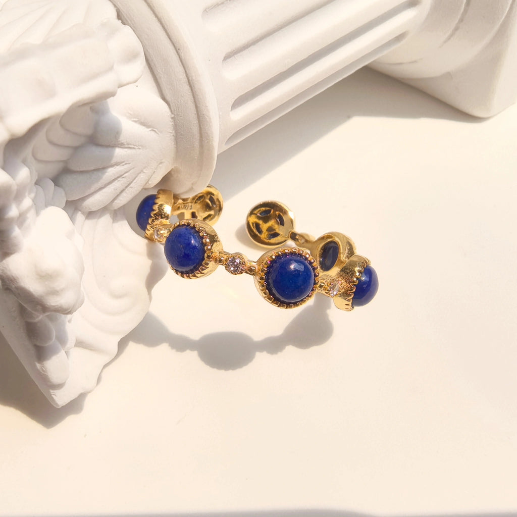 Ins celestial aesthetic flat lay of Milky Way Stroll lapis lazuli open ring, healing chakra crystal jewelry decor