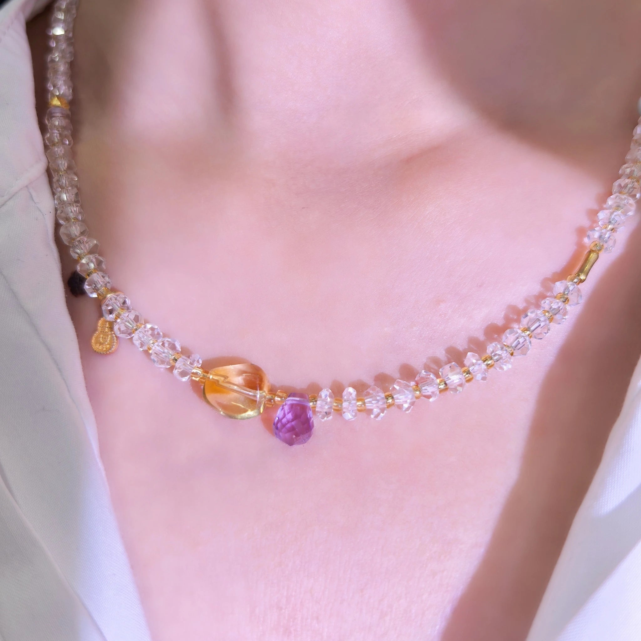 Woman wearing dainty Three Graces clear quartz wrap bracelet as necklace, perfect crystal jewelry gift for her.
