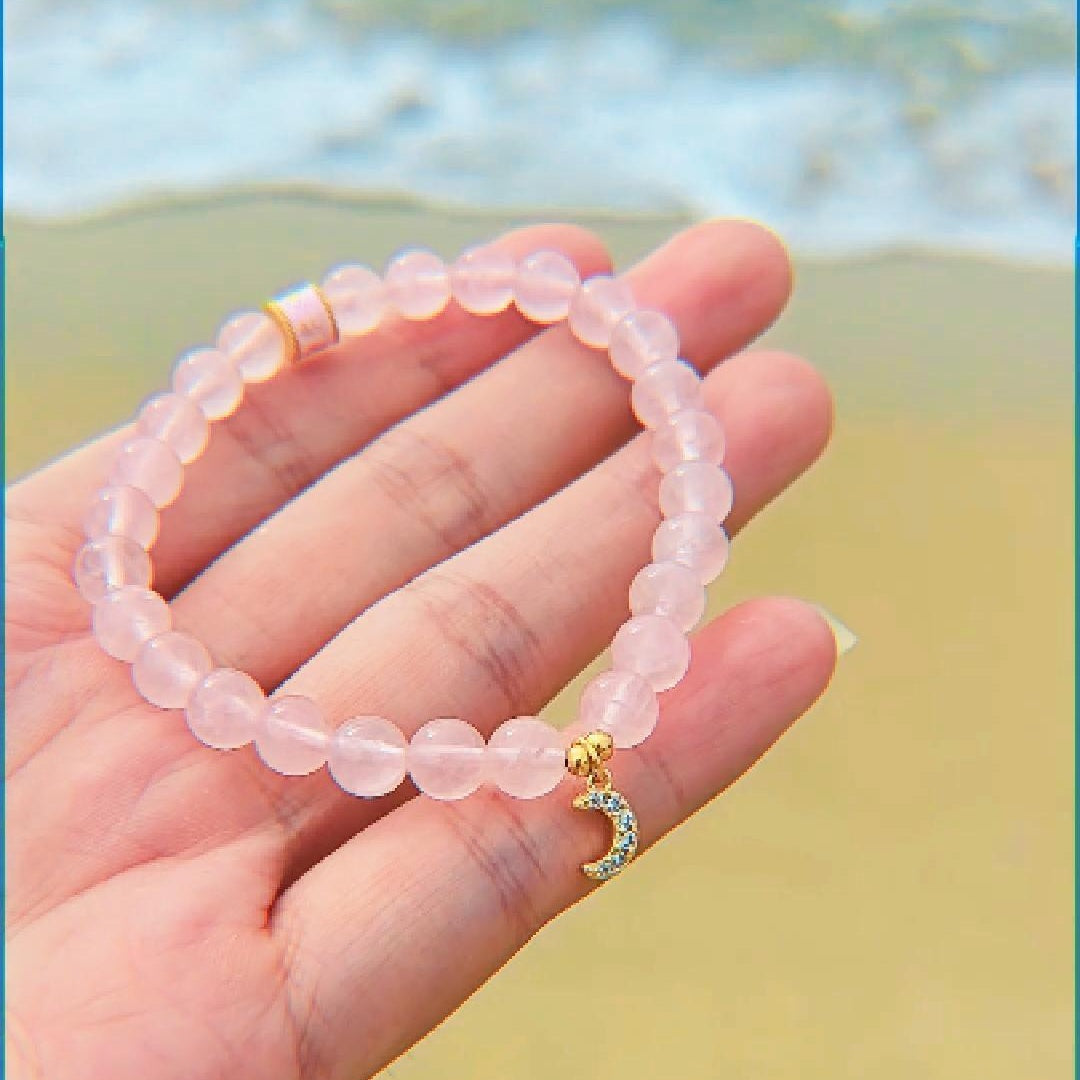 video of rose quartz cresent moon charm bracelet