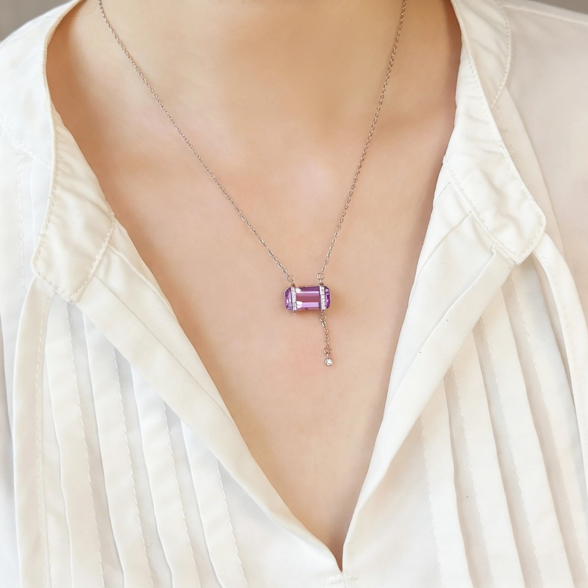 Woman wearing Violet Reverie Amethyst Necklace, elegant gift for mom.