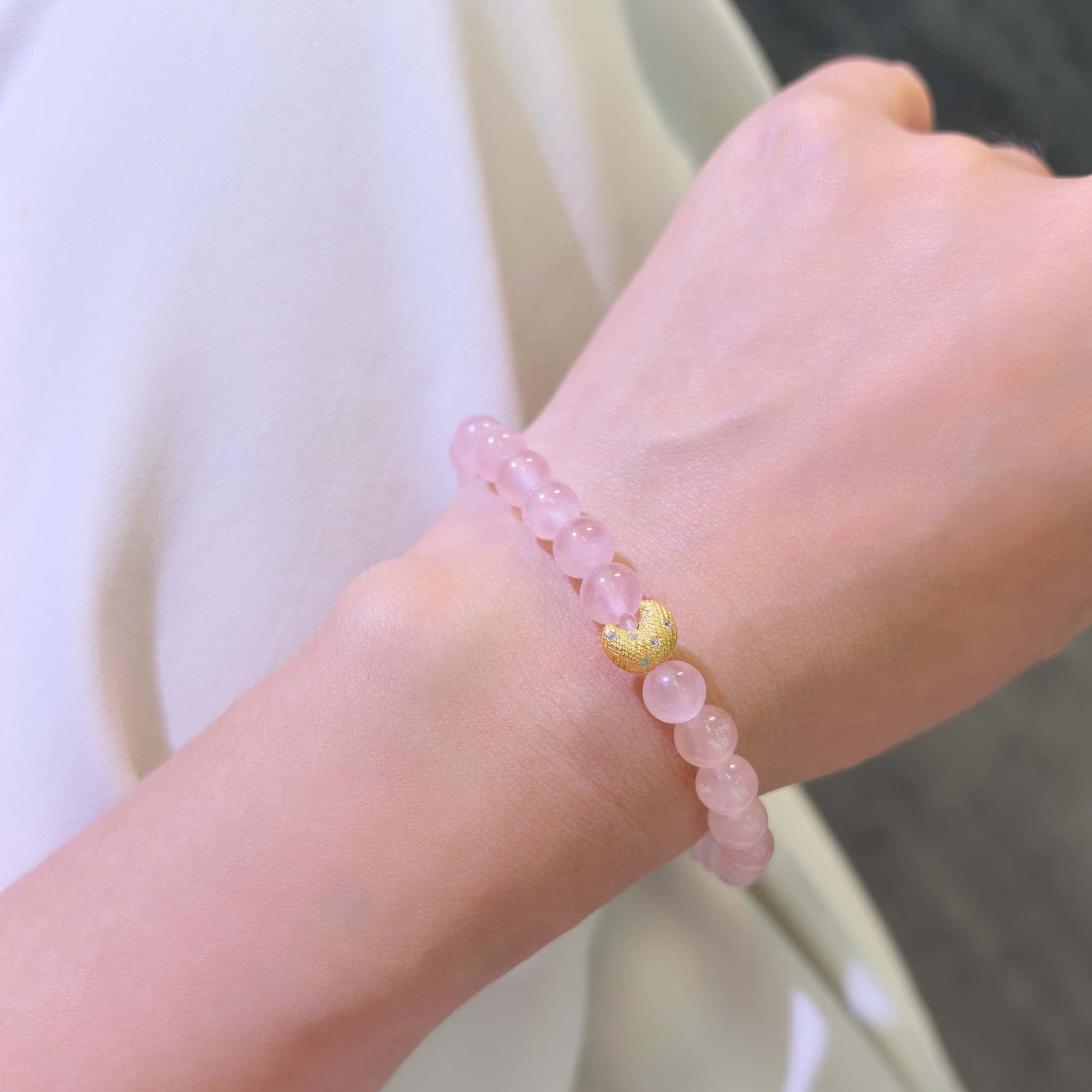 Women wearing Self-Love Lunar Mantra Rose Quartz Bracelet, minimalist witchy spiritual crystal wrist jewelry